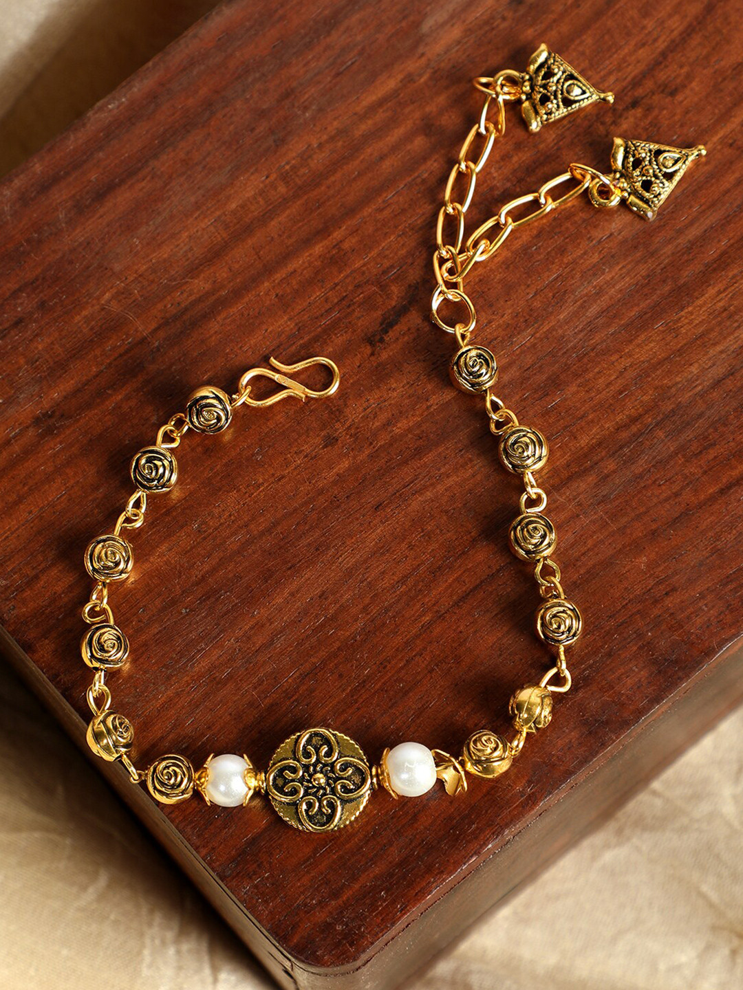 

ANIKAS CREATION Women Gold-Plated & White Pearls Charm Bracelet