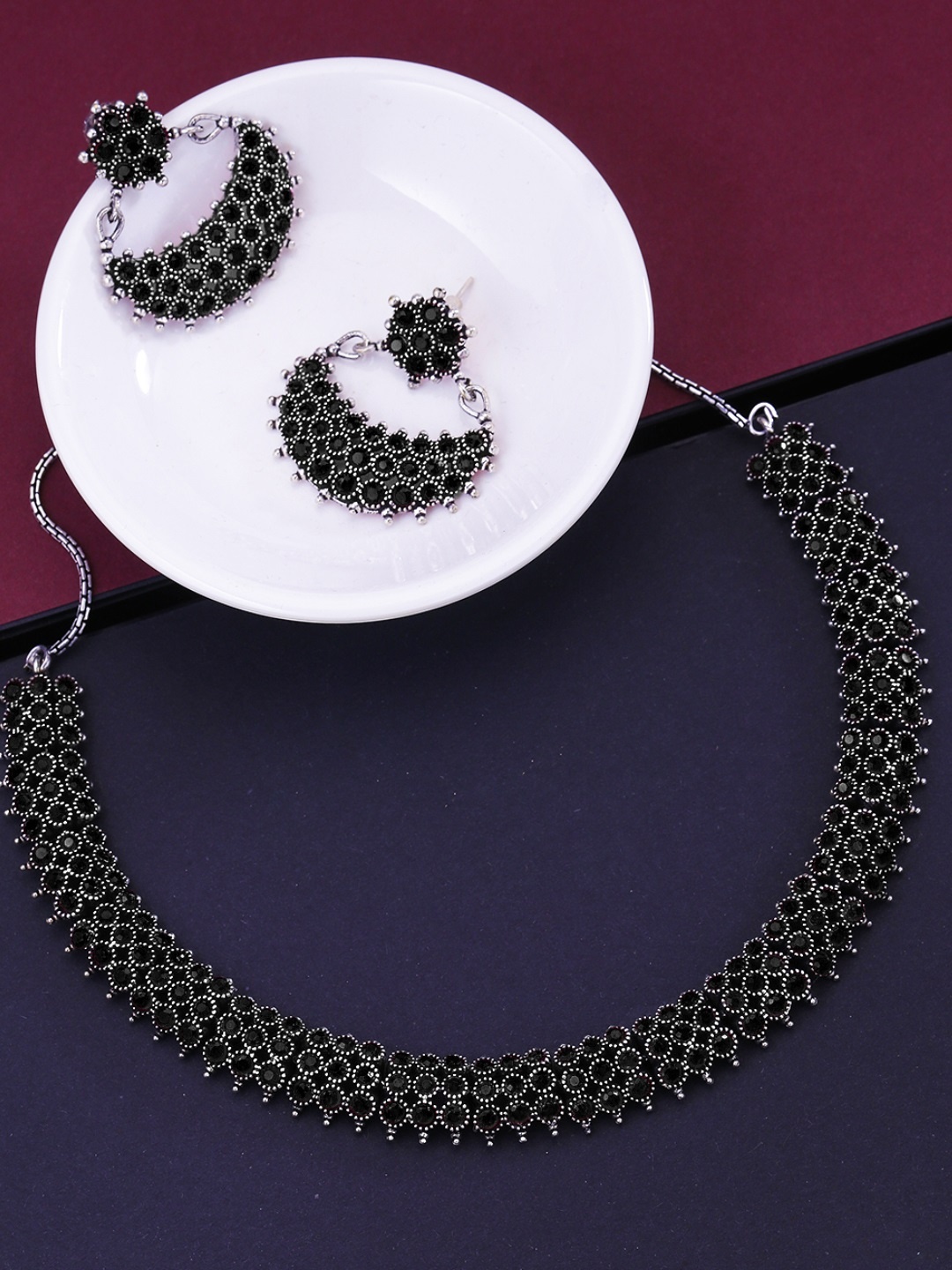 

Yellow Chimes Silver- Plated Oxidised Black Stone Studded Handcrafted Jewellery Set