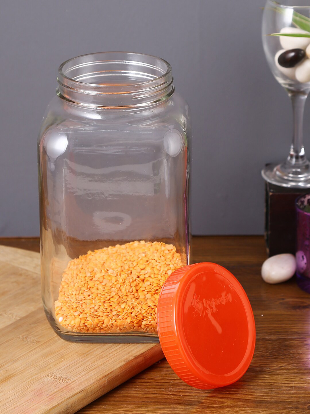 

Storehaus Transparent & Red Solid Square Storage Jar