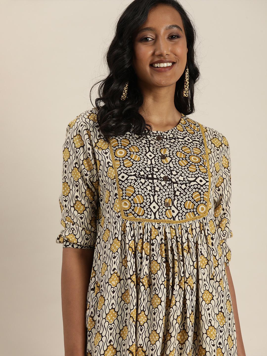 

Taavi Women Beige & Yellow Bagru Hand Block Print Sustainable Printed Kurta