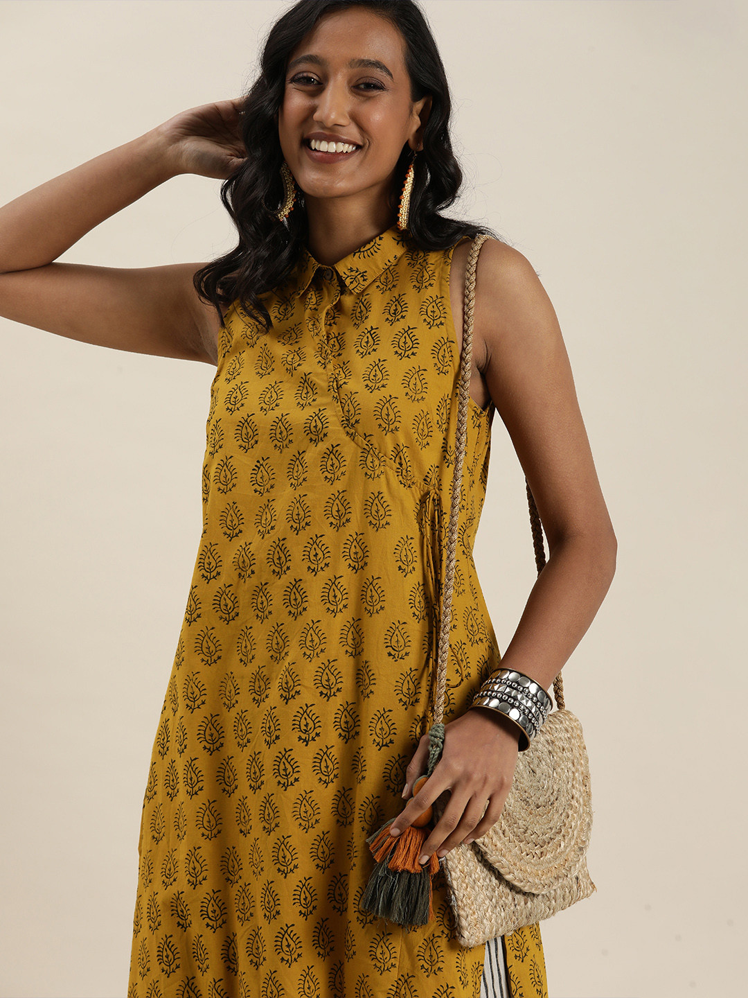 

Taavi Women Yellow & Black Bagru Hnad Block Pure Cotton Sustainable Printed Kurta