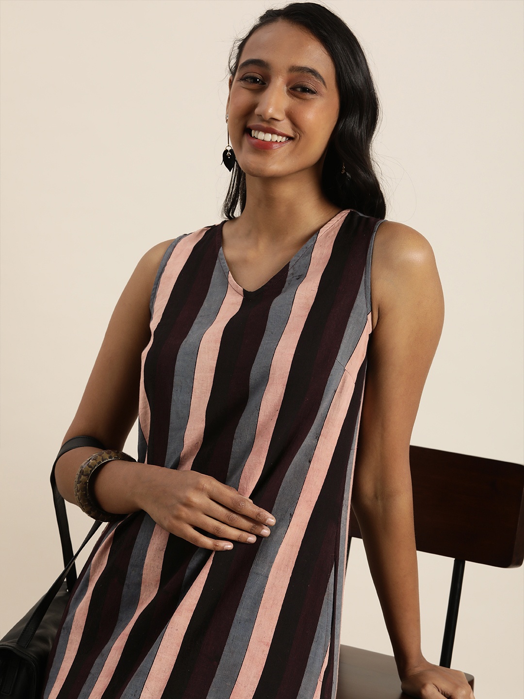 

Taavi Women Brown & Peach-Coloured Striped Ajrakh Kurta with Pocket Detail