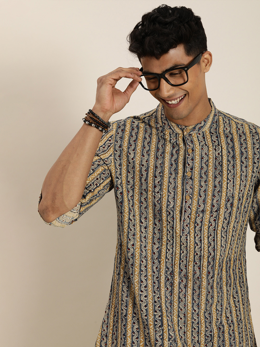 

Taavi Men Blue & Mustard Yellow Kalamkari Printed Sustainable Kurta With Roll Up Sleeves