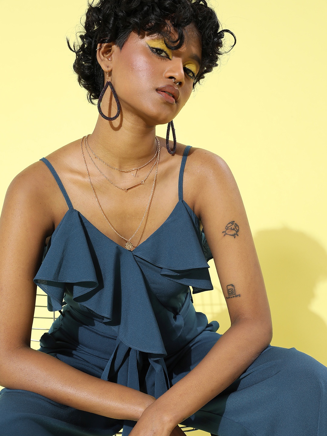 

Berrylush Women Blue Solid Ruffled Jumpsuit