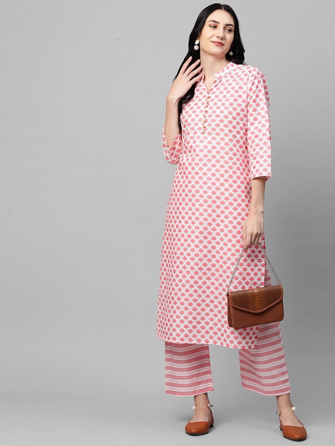 

GoSriKi Women Pink Floral Printed Regular Pure Cotton Kurta with Trousers
