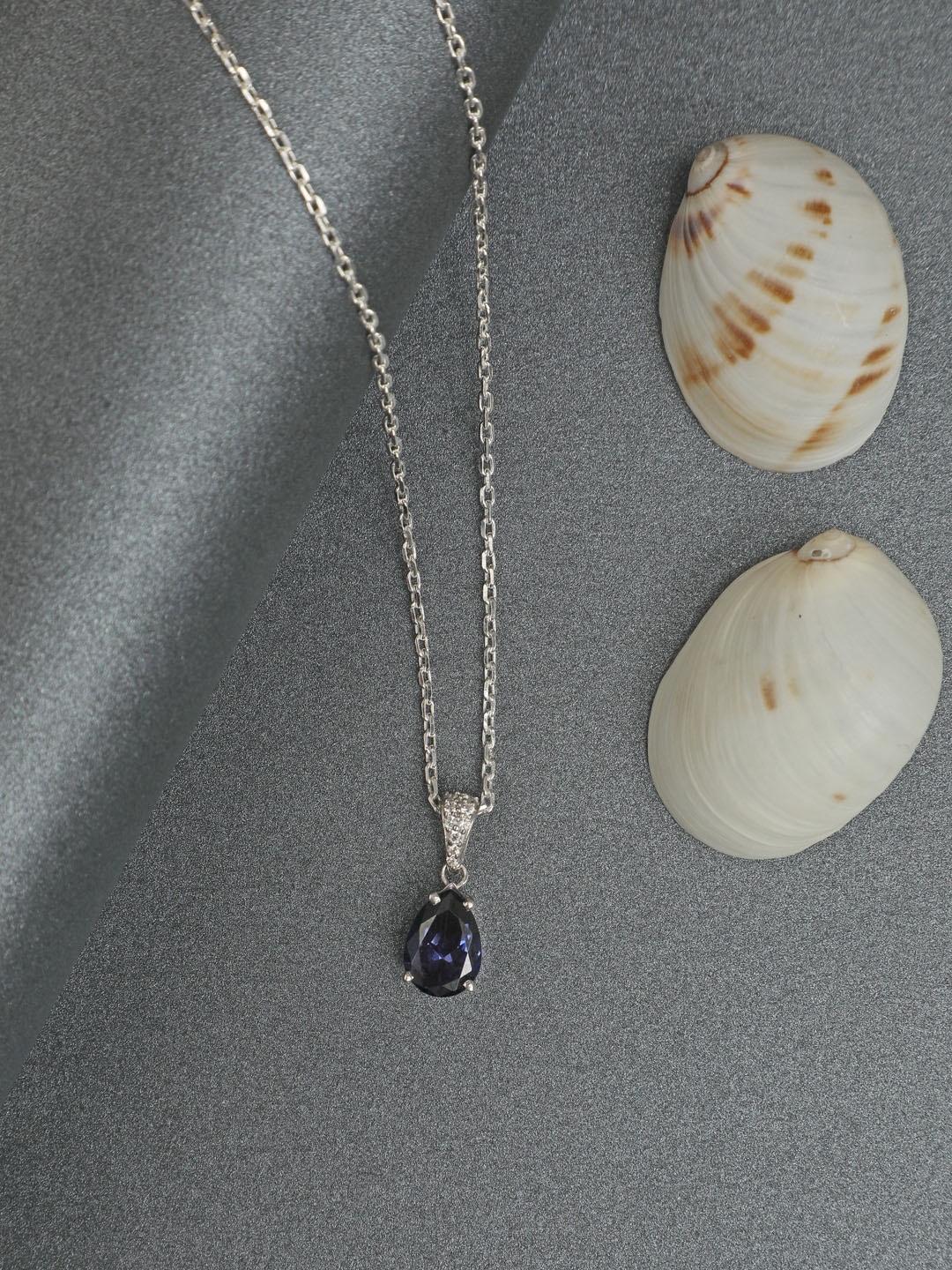 

CLARA 92.5 Sterling Silver Rhodium-Plated Swiss Blue Teardrop Pendant with Chain