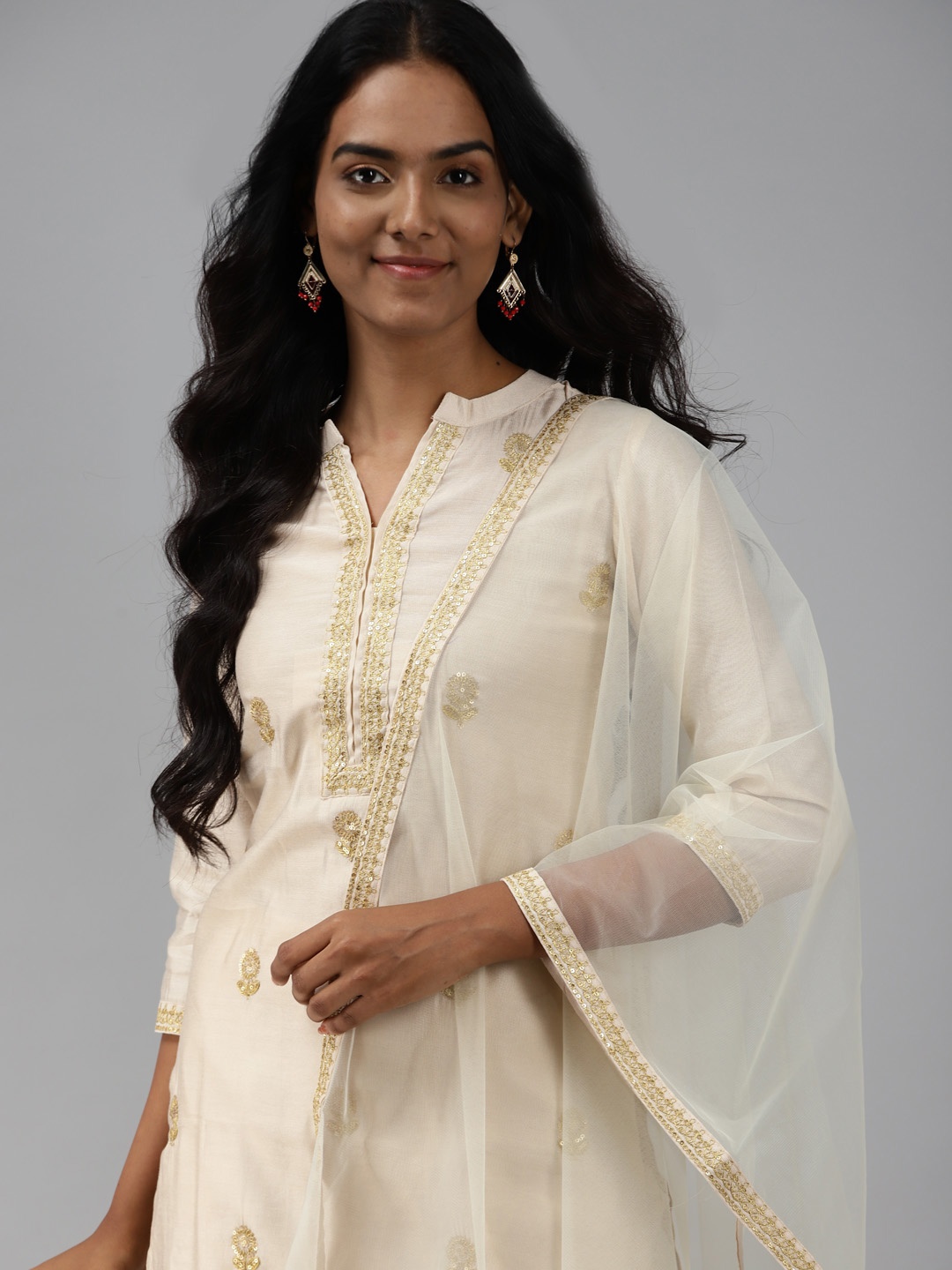 

Indo Era Women Off White Floral Embroidered Regular Sequinned Liva Kurta with Trousers & With Dupatta