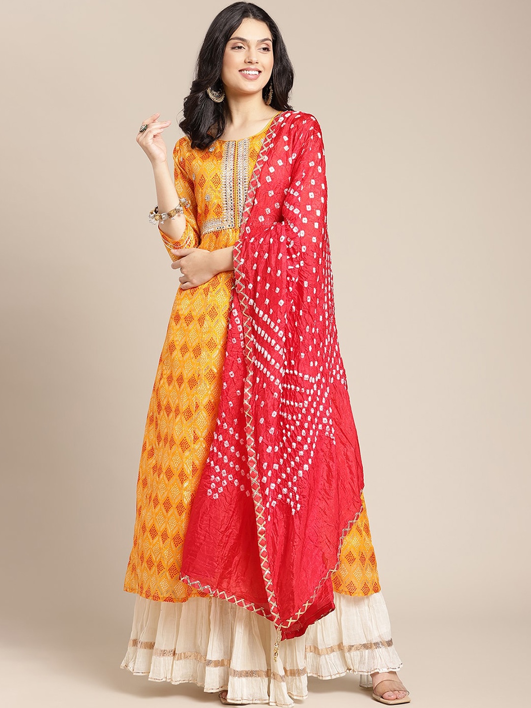 

KSUT Women Mustard Yellow & Silver-Toned Printed Mirror Work Anarkali Kurta