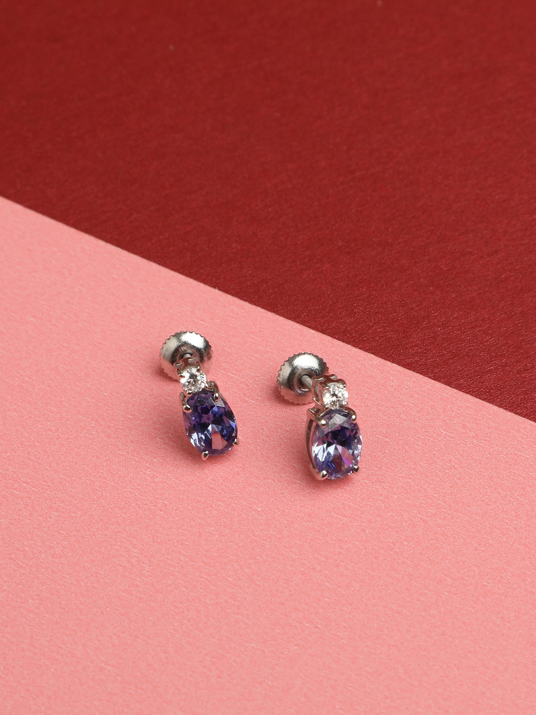 

Clara Silver-Toned & Blue Oval Studs Earrings