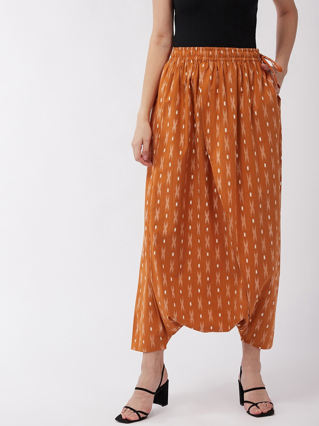

InWeave Women Orange & White Ikkat Printed Cotton Harem Pants