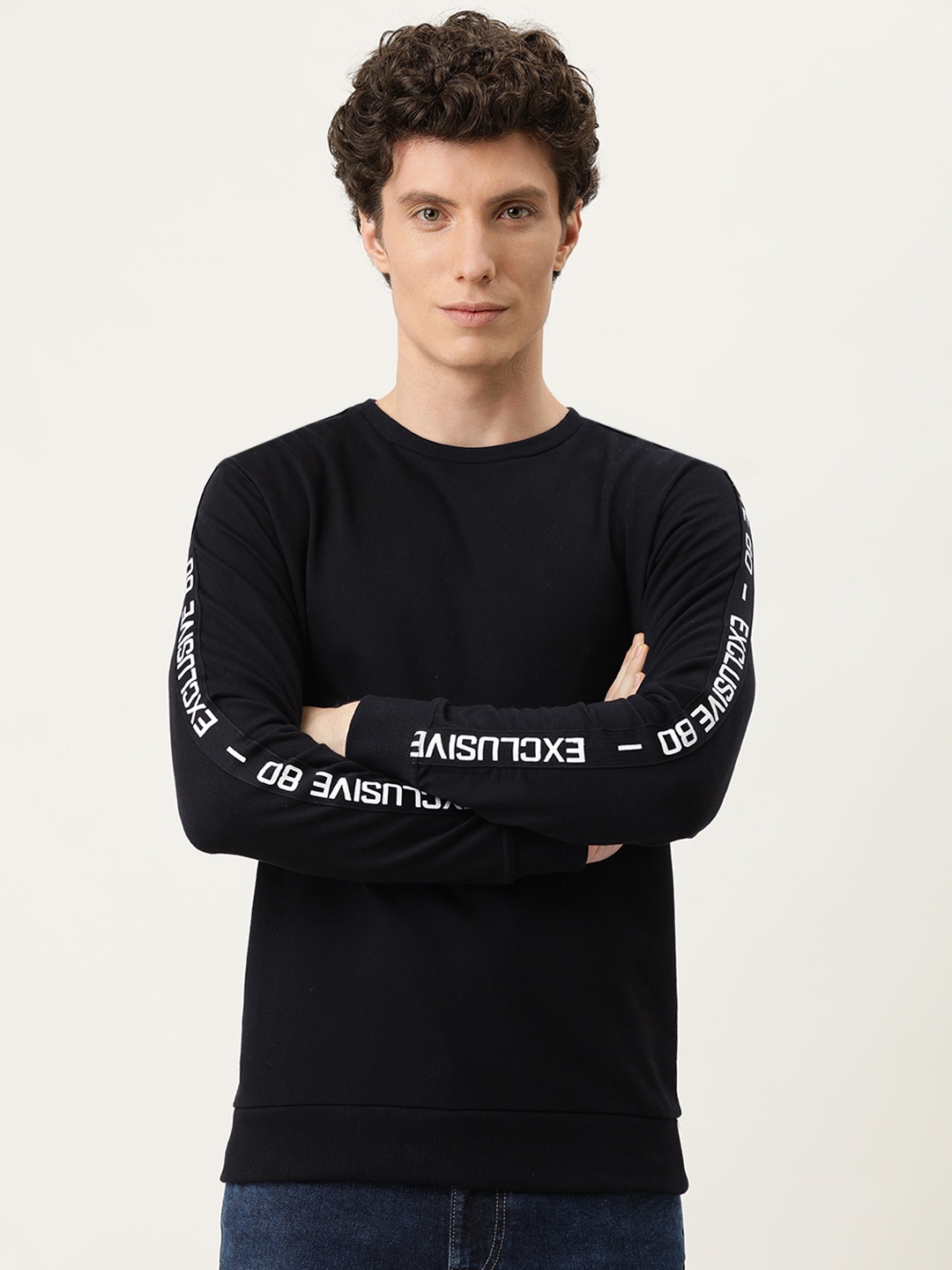 

Flying Machine Men Black Solid Pure Cotton Pullover Sweatshirt