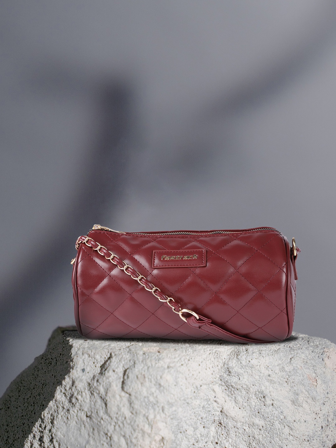 

Fastrack Women Solid Quilted Bowling Cylinder Sling Bag, Maroon