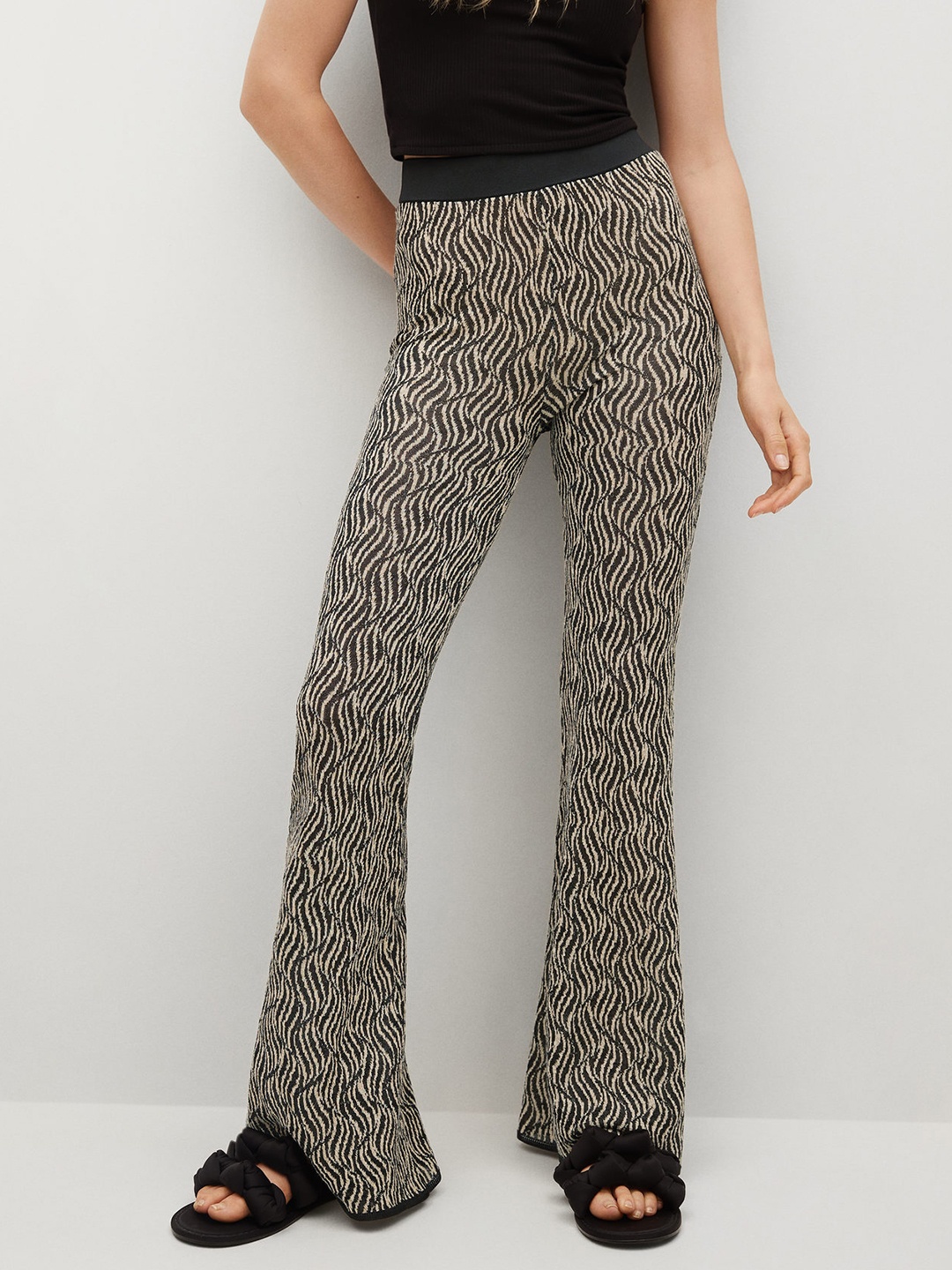 

MANGO Women Beige & Black Printed Bootcut Trousers