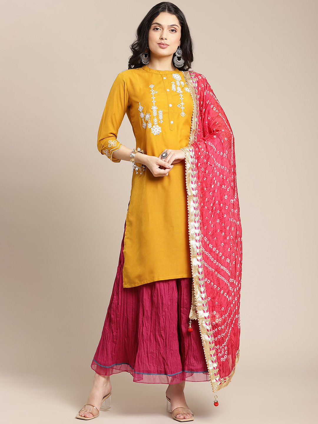 

Varanga Women Mustard Yellow & Red Embroidered Kurta & Palazzo With Dupatta