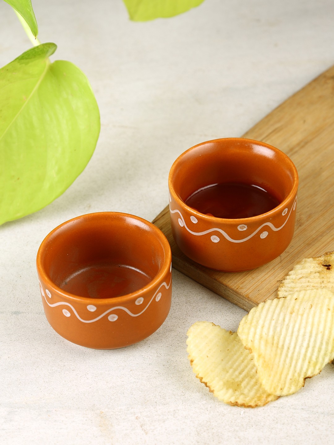 

Aapno Rajasthan Brown & White 4 Pieces Hand Painted Printed Ceramic Glossy Bowls