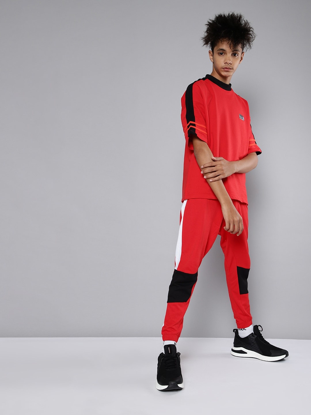 

HRX By Hrithik Roshan U-17 Lifestyle Boys High risk red Bio-Wash Brand Carrier Joggers