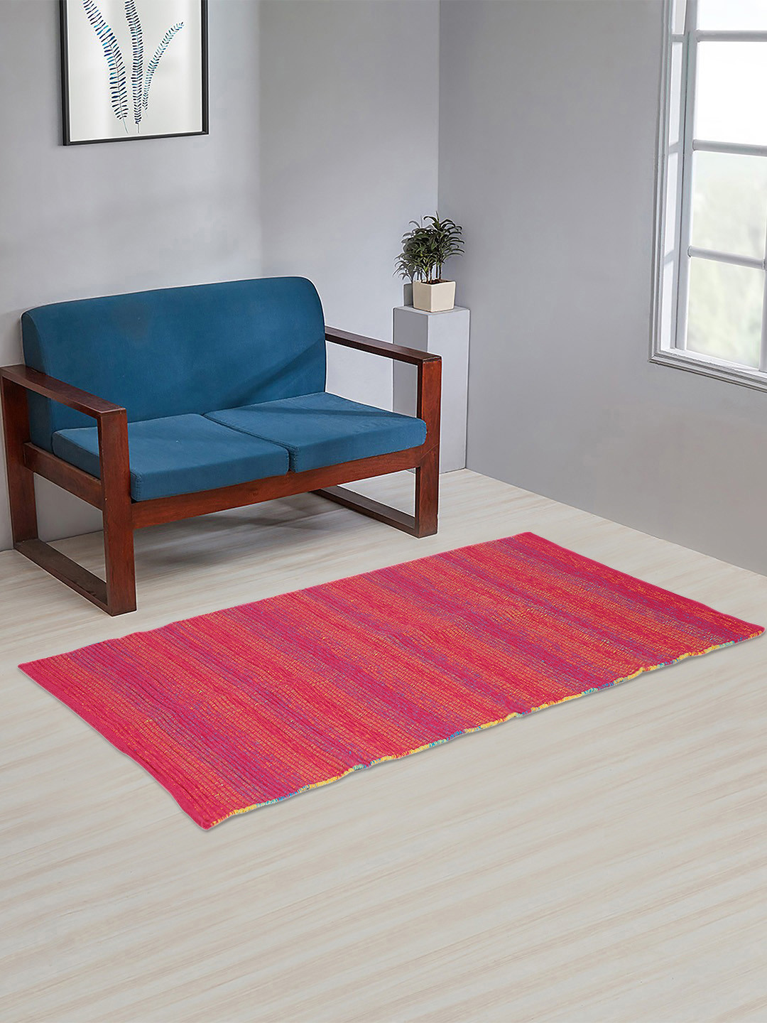 

Fabindia Pink & Orange Striped Cotton Floor Mat