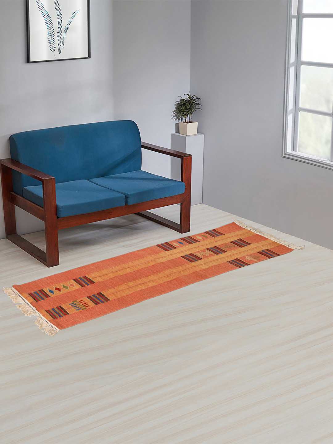 

Fabindia Rust Orange Woven Design Wool Floor Mat