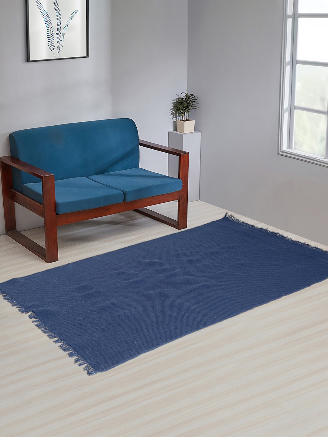 

Fabindia Blue Solid Cotton Floor Mat