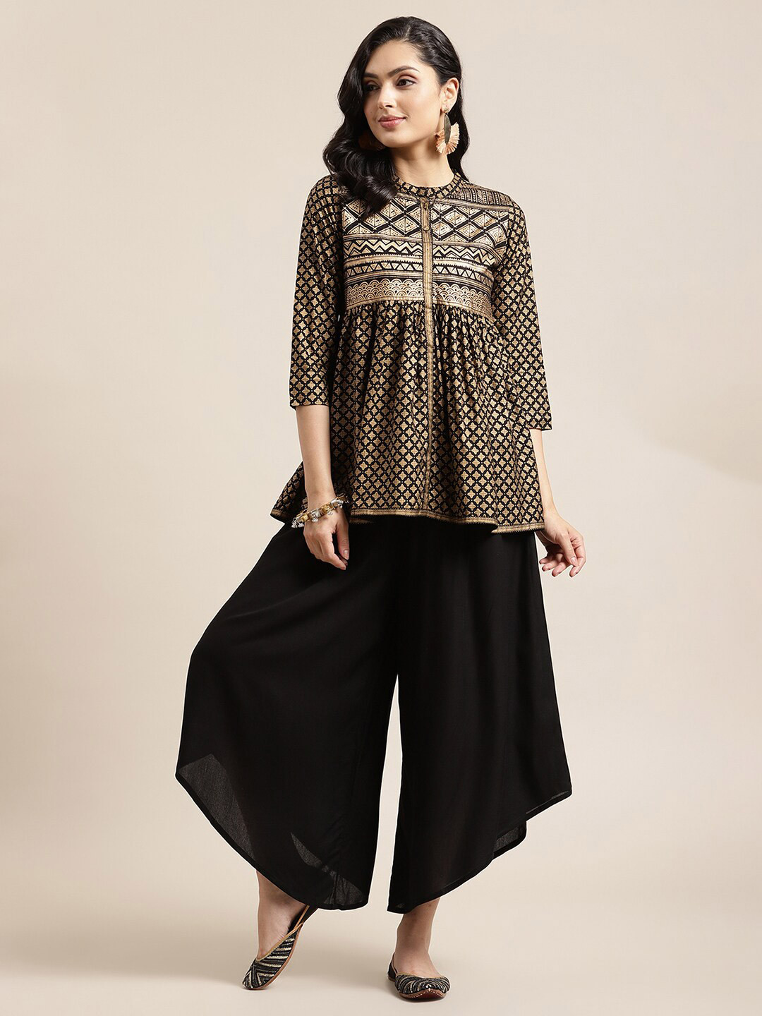 

Varanga Women Black & Golden Printed Tunic with Palazzos