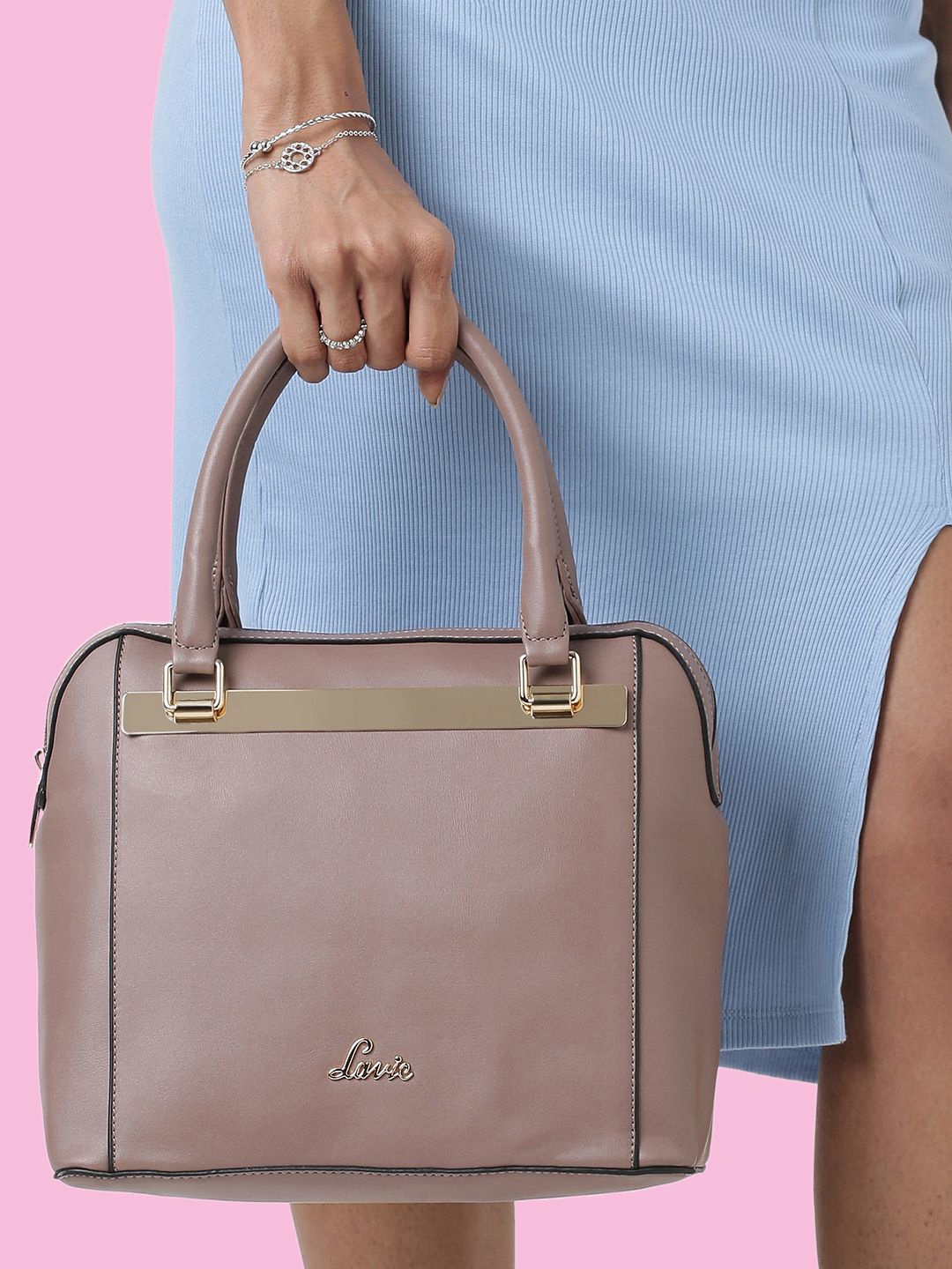 

Lavie Eero Pink Solid PU Regular Structured Handheld Bag