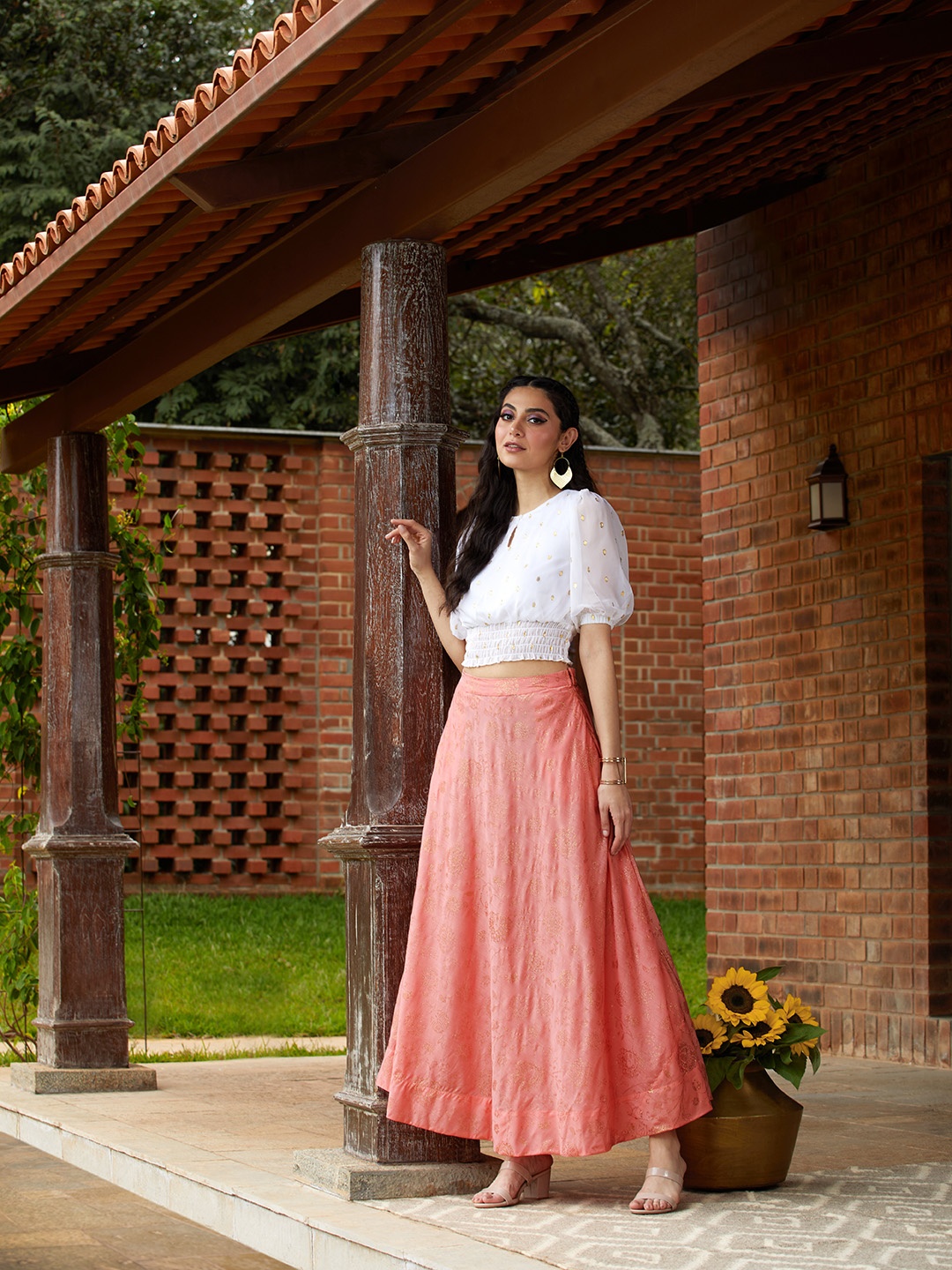 

Global Desi Women Peach Pink & Gold-toned Embellished Paneled Flared Maxi Skirt