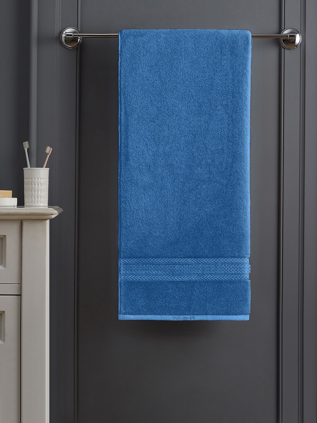 

Raymond Home Blue Solid 450 GSM Cotton Bath Towel