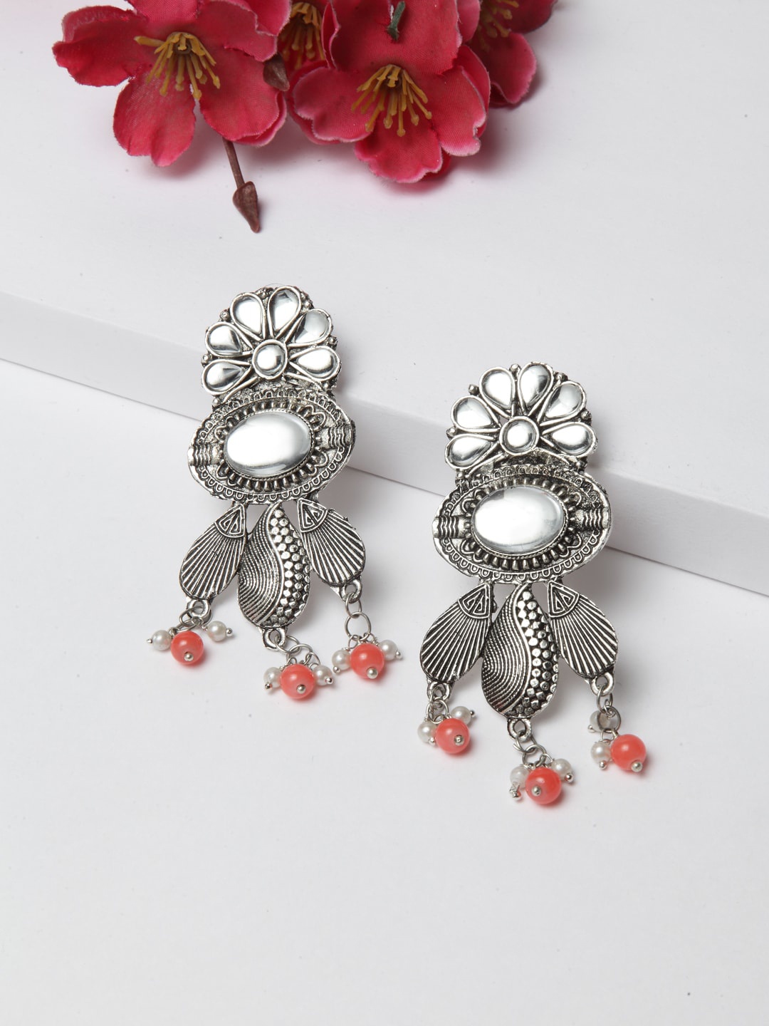 

Moedbuille Silver-Toned & Orange Contemporary Drop Earrings