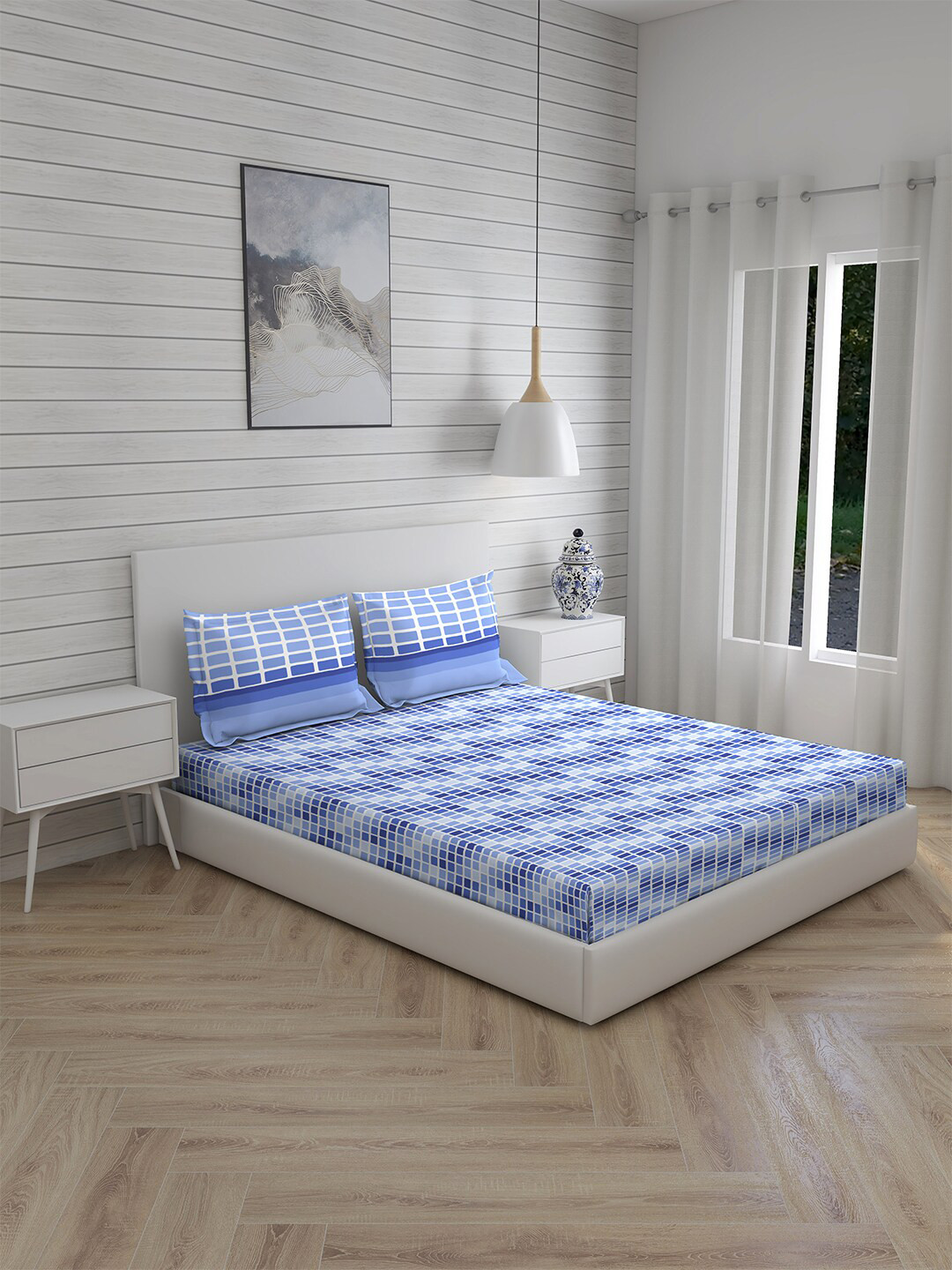

Layers Blue & White Geometric 104 TC Cotton Queen Bedsheet with 2 Pillow Covers