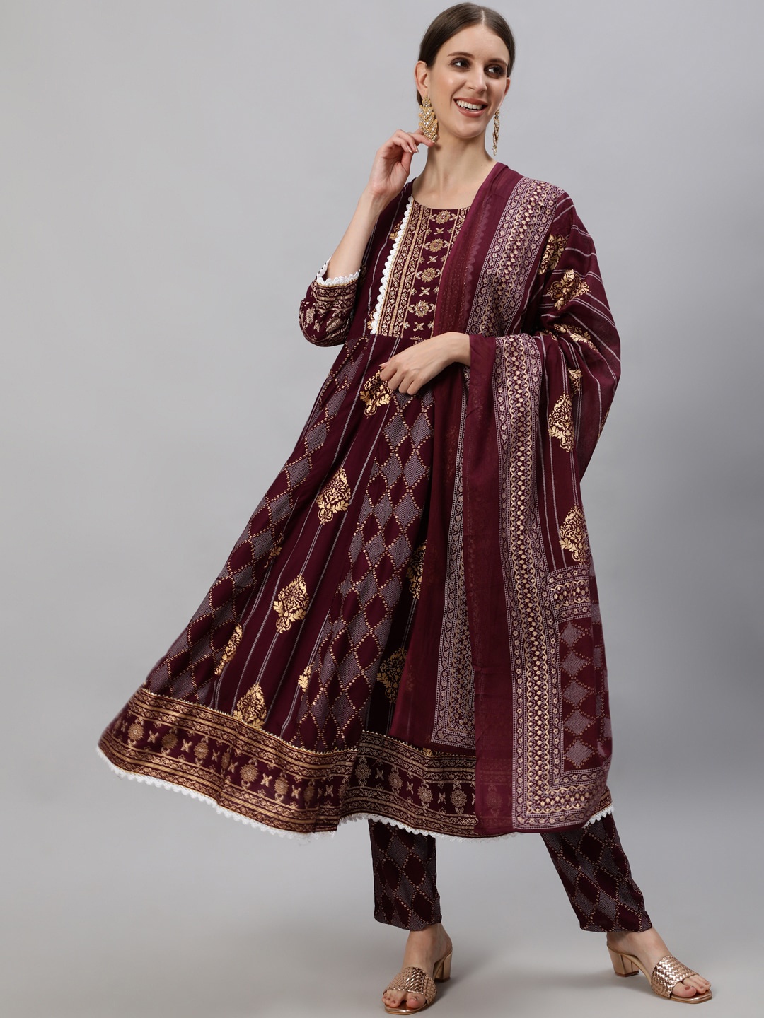 

Ishin Women Burgundy Ethnic Motifs Printed Regular Thread Work Kurta with Trousers & With Dupatta