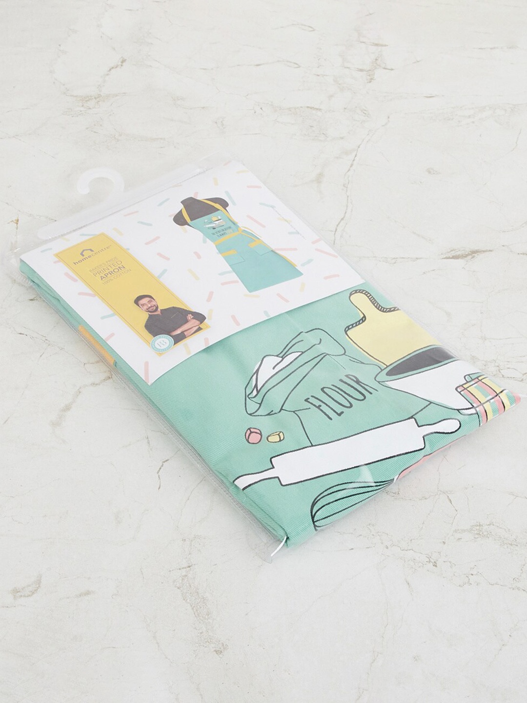 

Home Centre Teal Green Printed Oil Apron