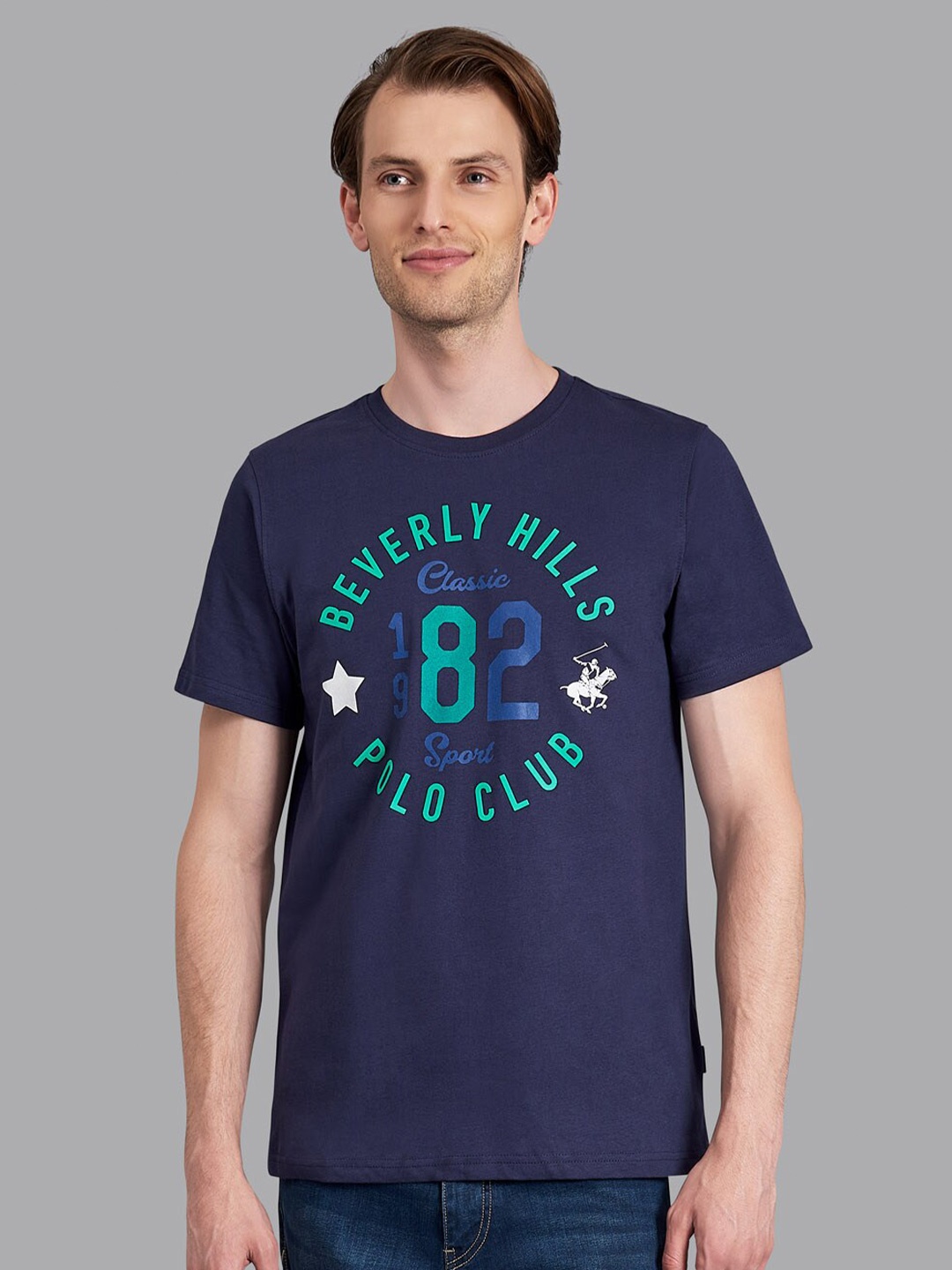 

Beverly Hills Polo Club Men Navy Blue Varsity Printed T-shirt