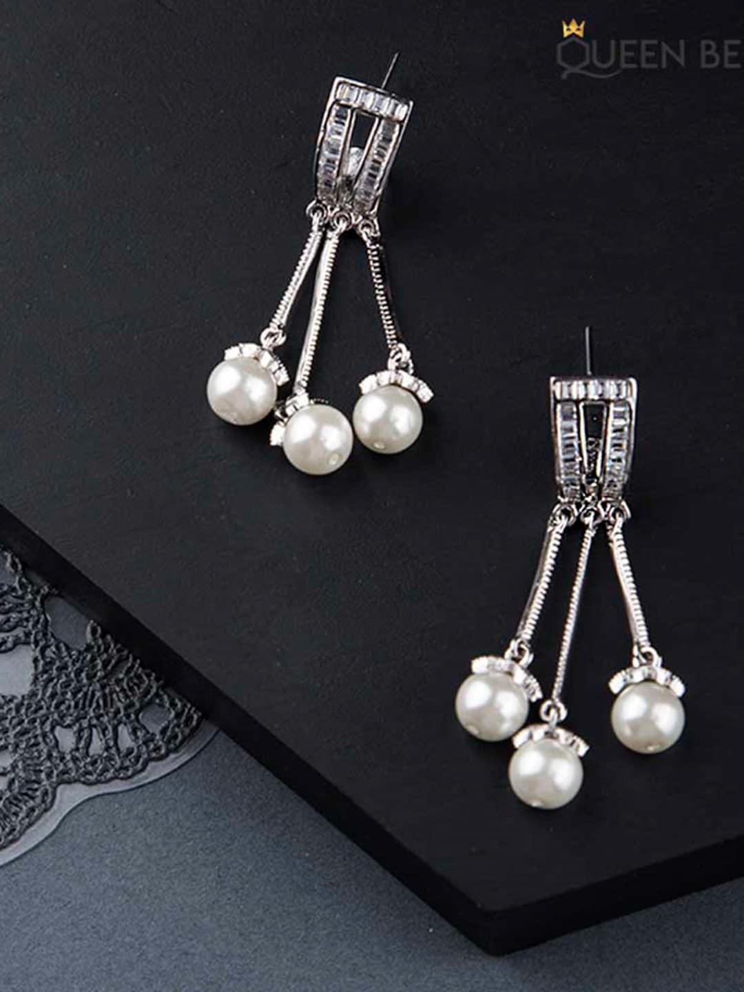 

Queen Be Silver-Toned & White Contemporary Drop Earrings