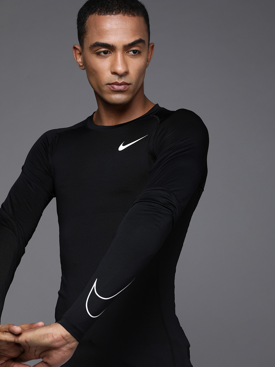 

Nike Men Black Solid AS NP DF Tight Running T-shirt