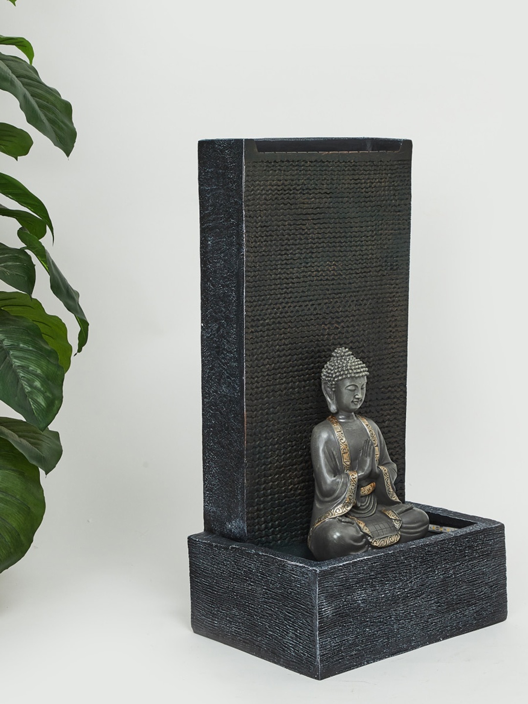 

Home Centre Black & Grey Cascade Yellow Buddha Fountain