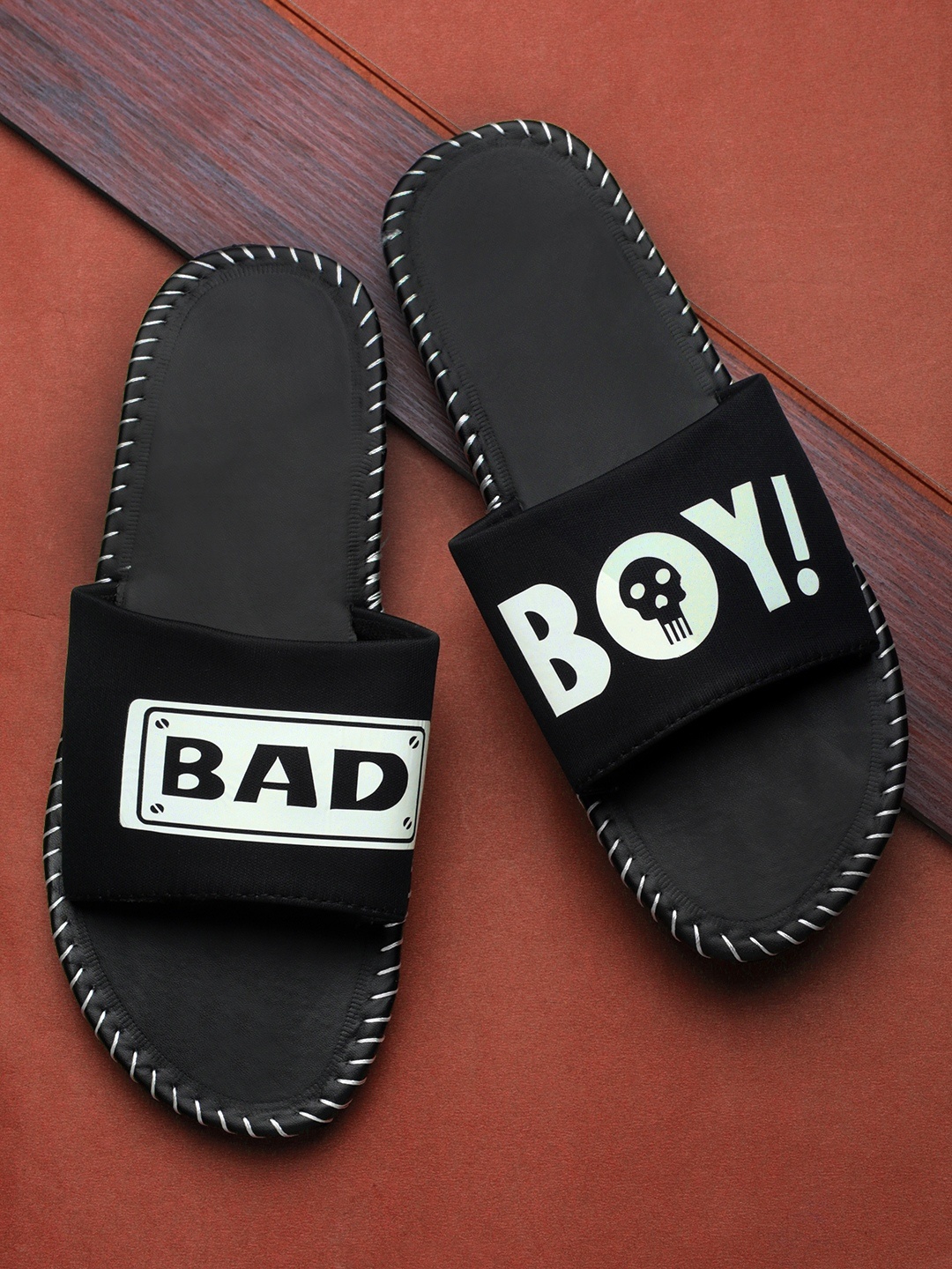 

Pampy Angel Men Black & White Printed Rubber Sliders