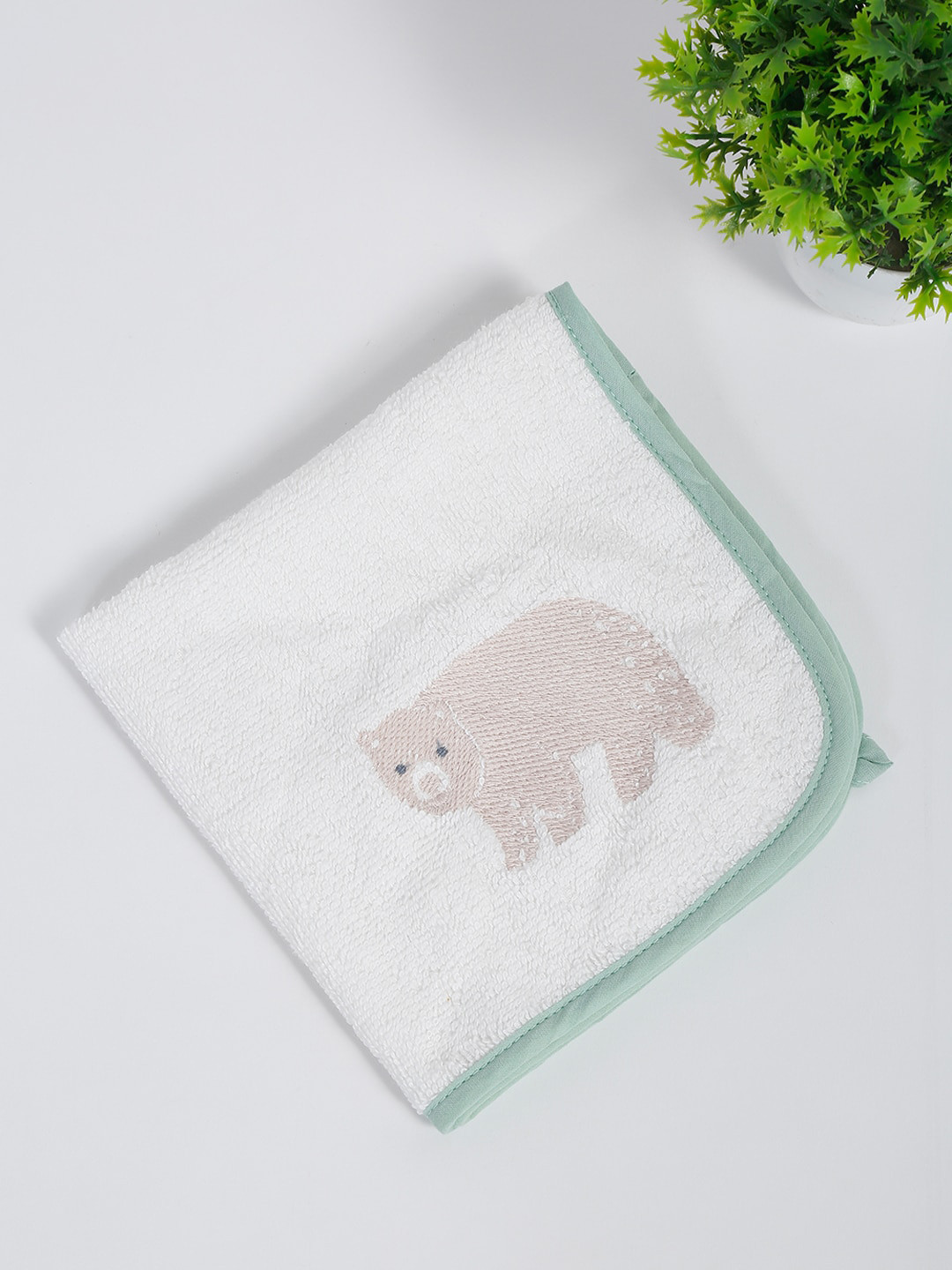 

Fabindia White & Pink Cotton Terry Hand Towel