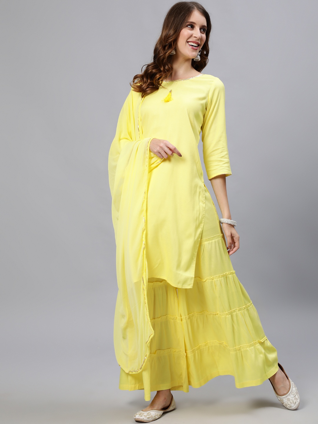 

Jaipur Kurti Women Yellow Kurta with Sharara