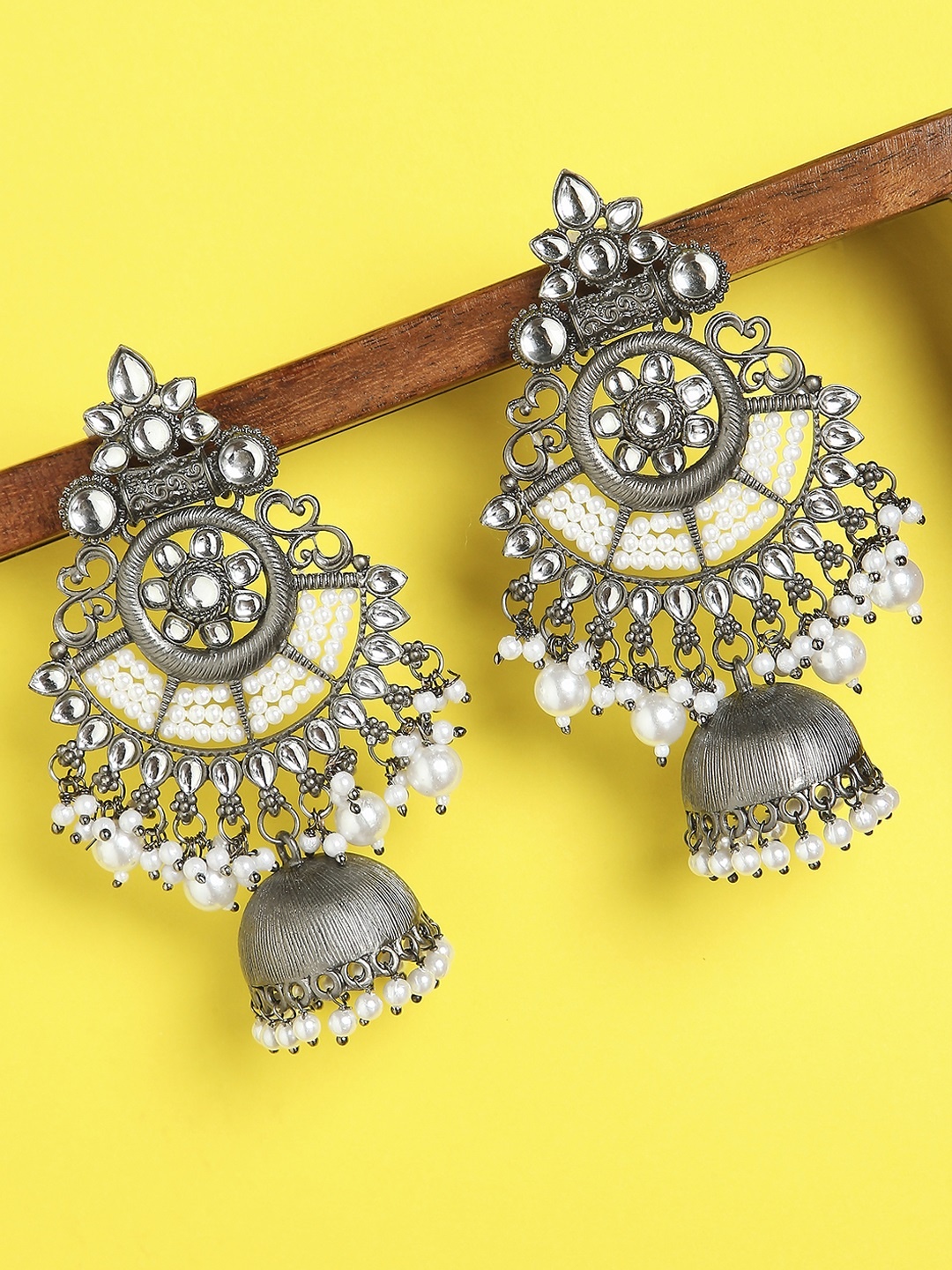 

OOMPH Silver-Toned Dome Shaped Jhumkas Earrings