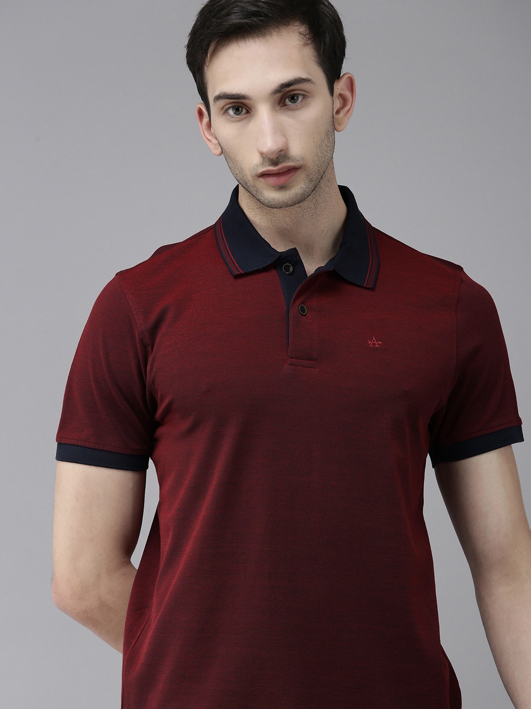 

Arrow Sport Men Red Self-Design Polo Collar T-shirt