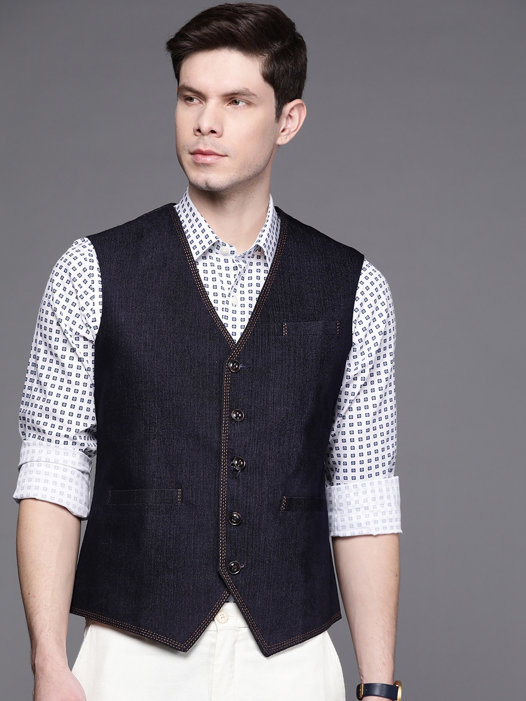 

Manu Men Navy Blue Solid Denim Waistcoat
