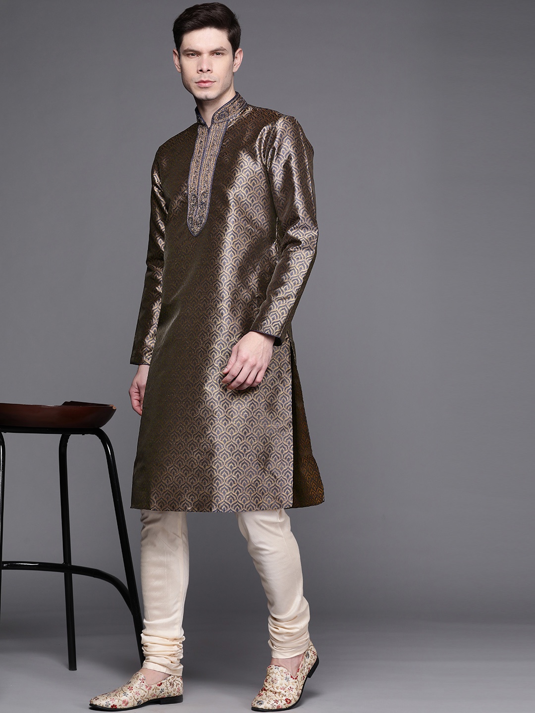 

Manu Men Navy Blue & Bronze Toned Ethnic Motifs Self Design Kurta with Churidar