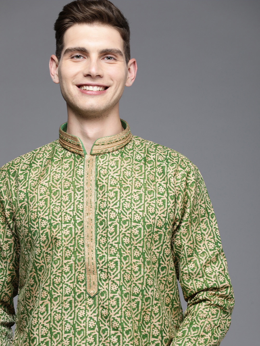 

Manu Men Green Ethnic Motifs Printed Thread Work Kurta with Churidar