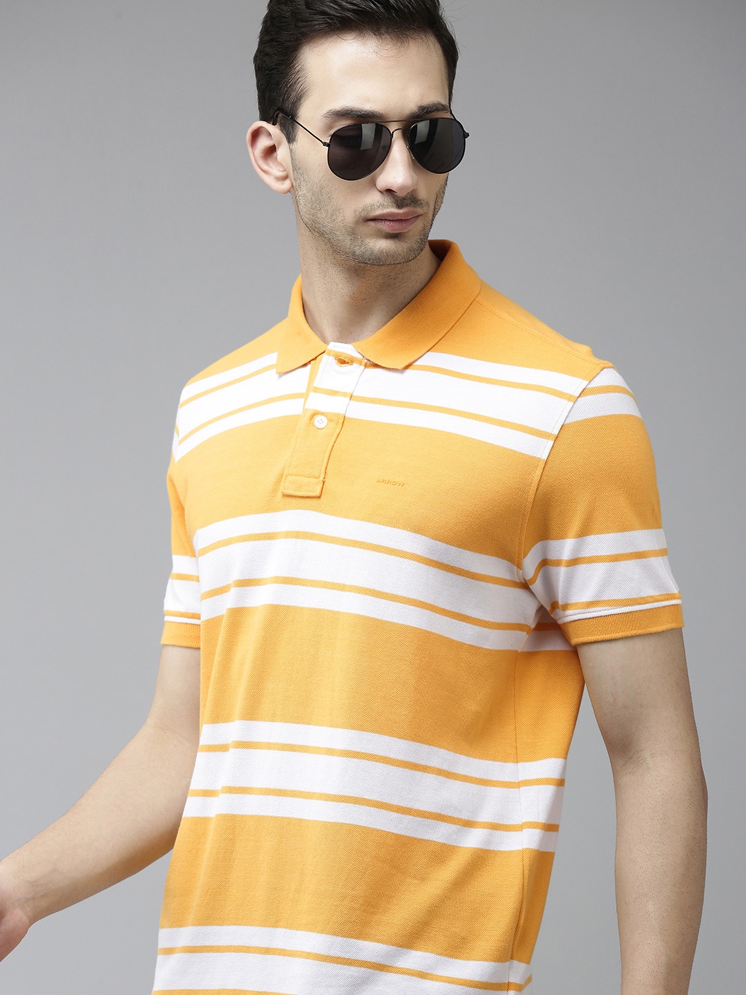 

Arrow Men Yellow & White Striped Pure Cotton Polo Collar T-shirt