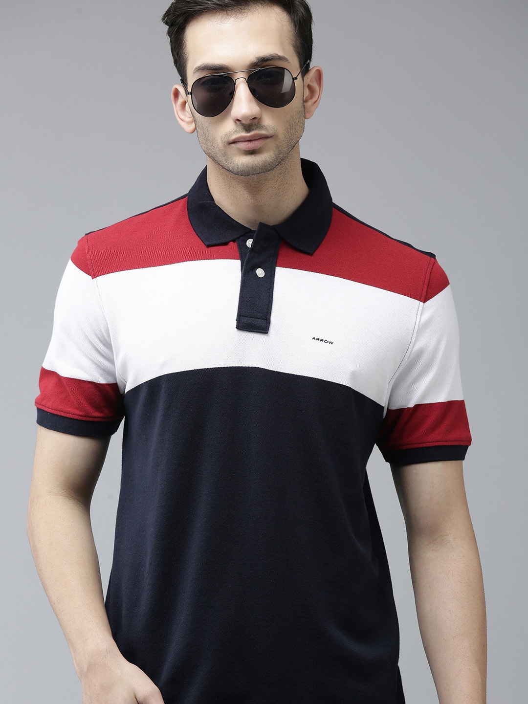 

Arrow Men Navy Blue & White Colourblocked Pure Cotton Polo Collar T-shirt
