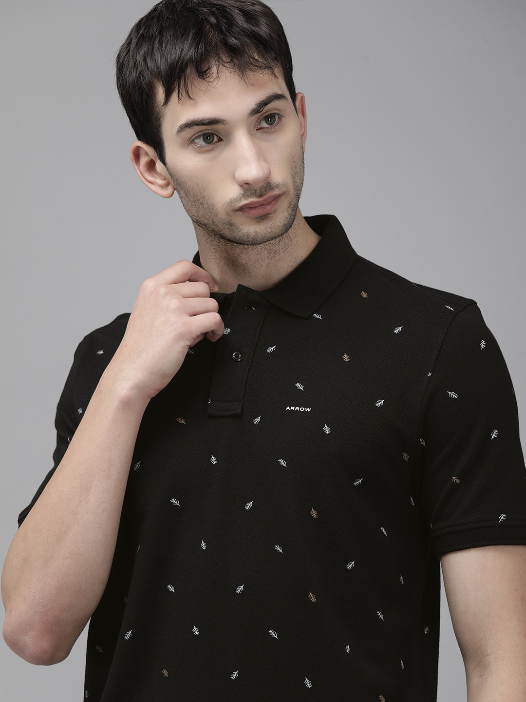 

Arrow Men Black Geometric Printed Regular Fit Pure Cotton Polo Collar Casual Pure Cotton T-shirt