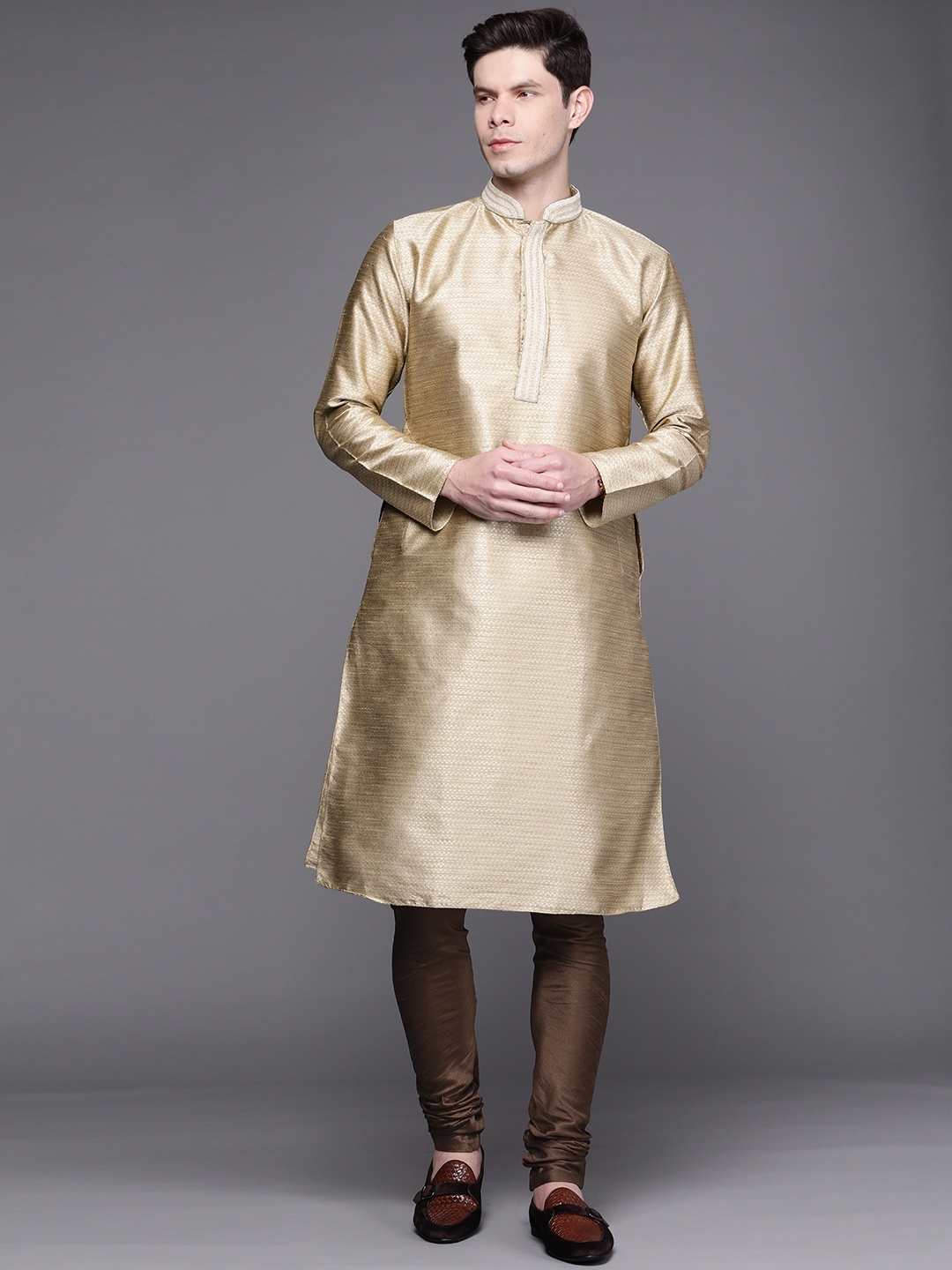 

Manu Men Beige Ethnic Motifs Embroidered Regular Kurta with Churidar