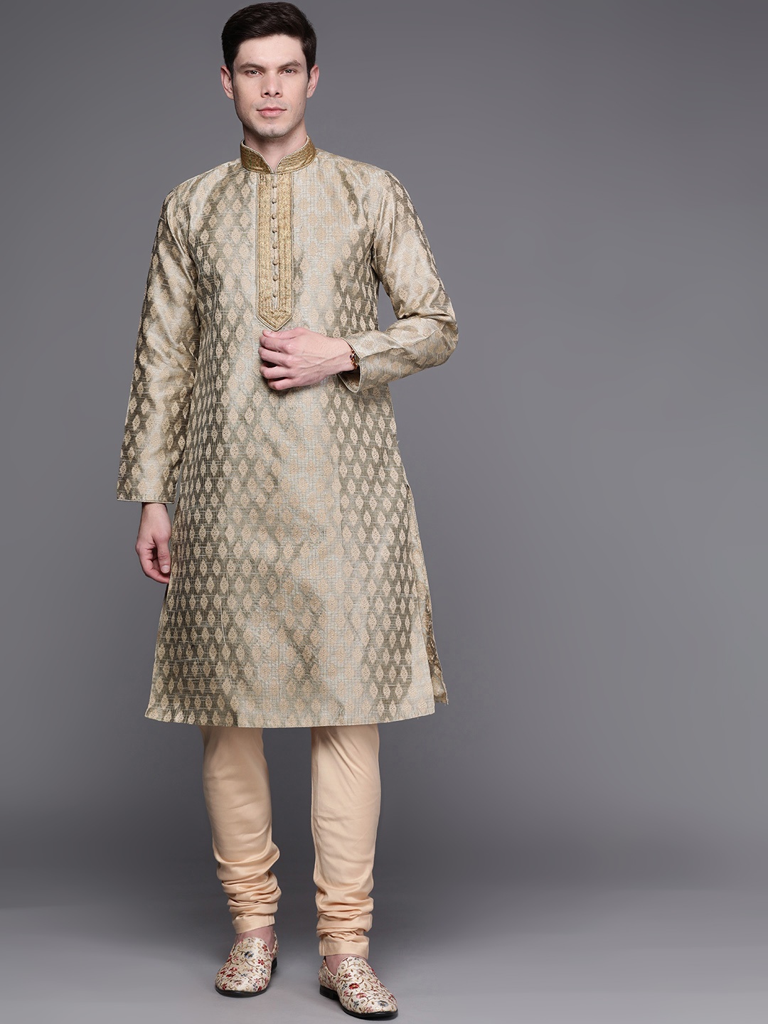 

Manu Men Olive Green & Golden Ethnic Motifs Regular Kurta with Churidar