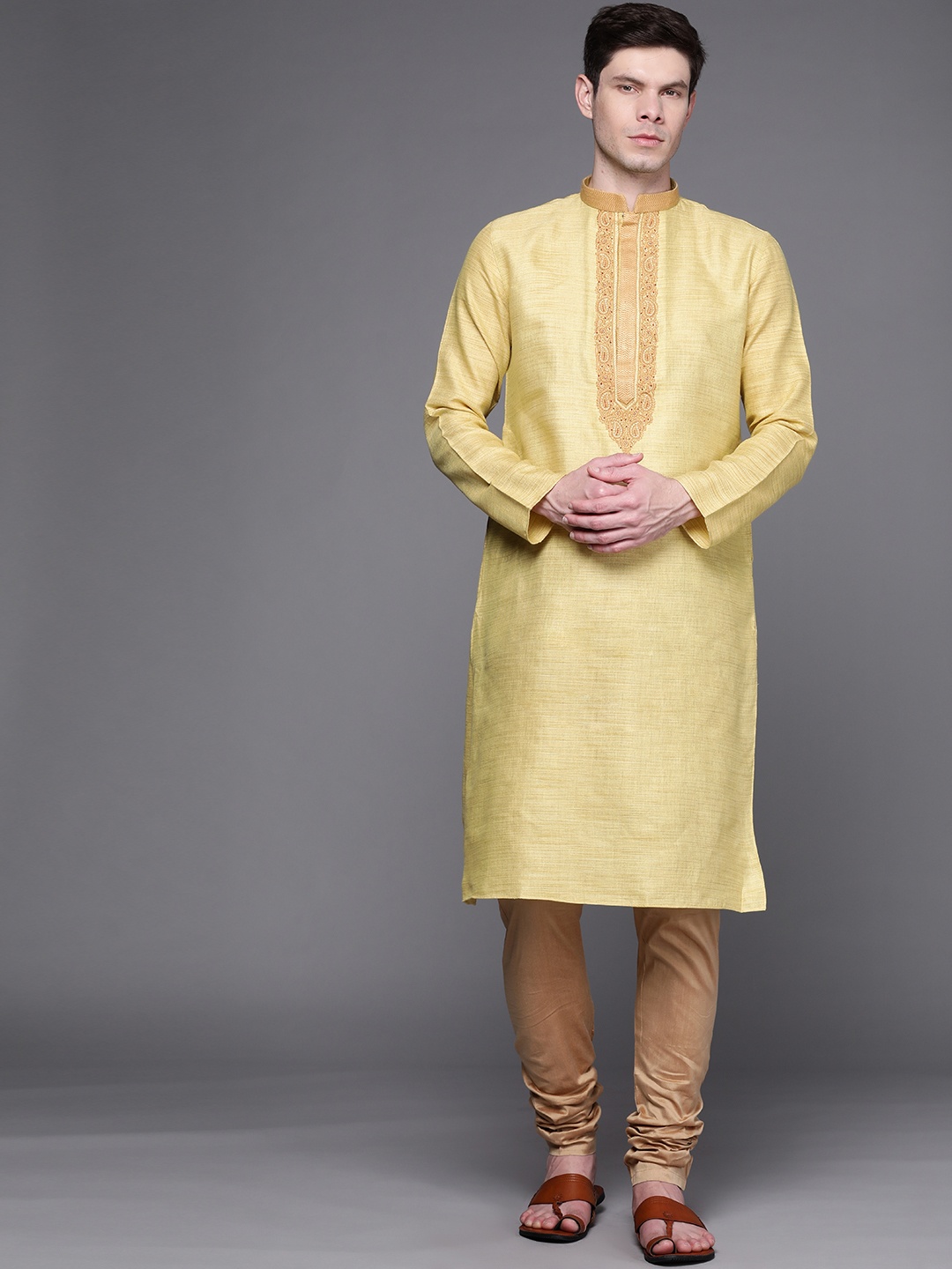 

Manu Men Yellow & Beige Ethnic Motifs Yoke Design Regular Kurta with Churidar