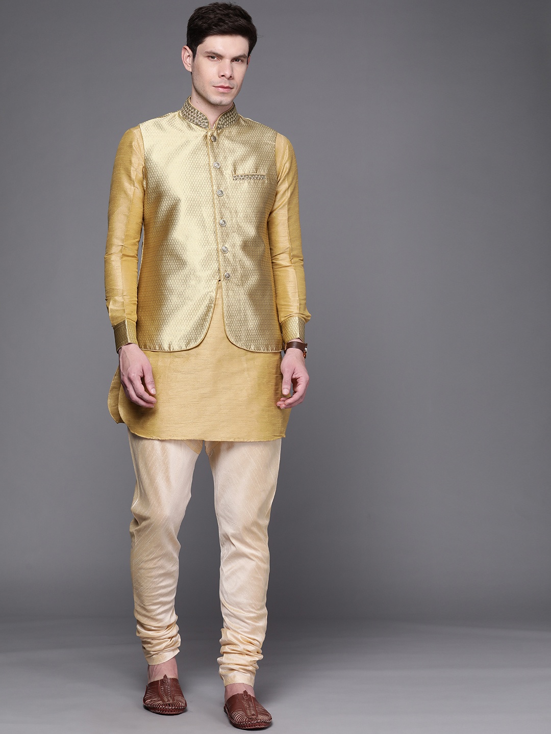 

Manu Men Mustard Yellow & beige Regular Kurta with Churidar & Waistcoat